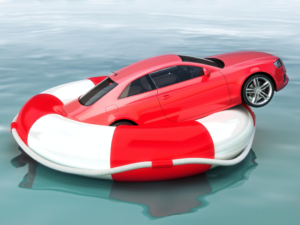 A small toy red car in a life buoy