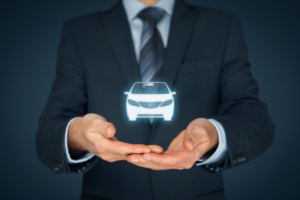 A man showing a holographic car illustration