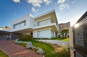 A white home with a garden